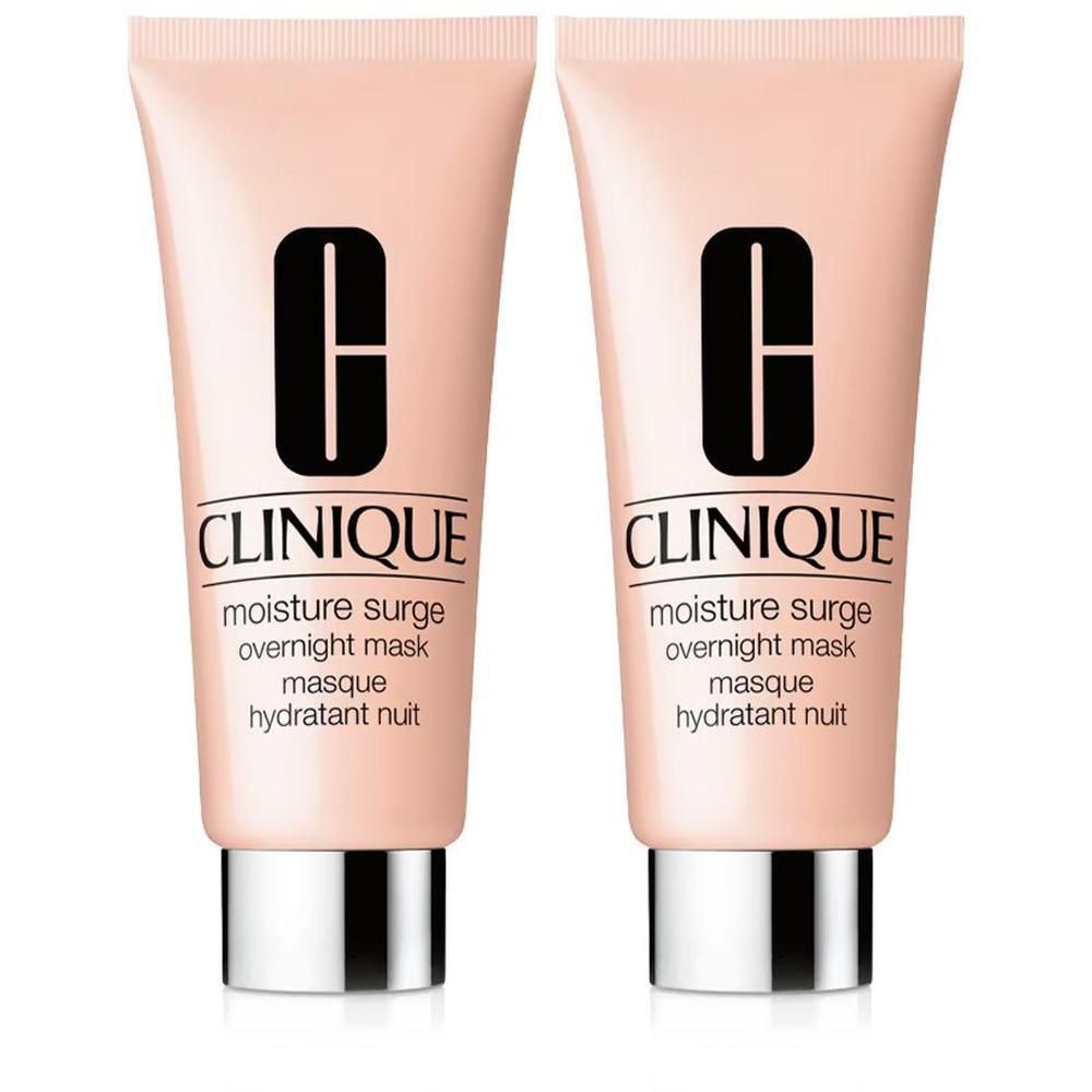 Zwei Clinique Moisture Surge Overnight Mask Tuben mit silbernem Verschluss.