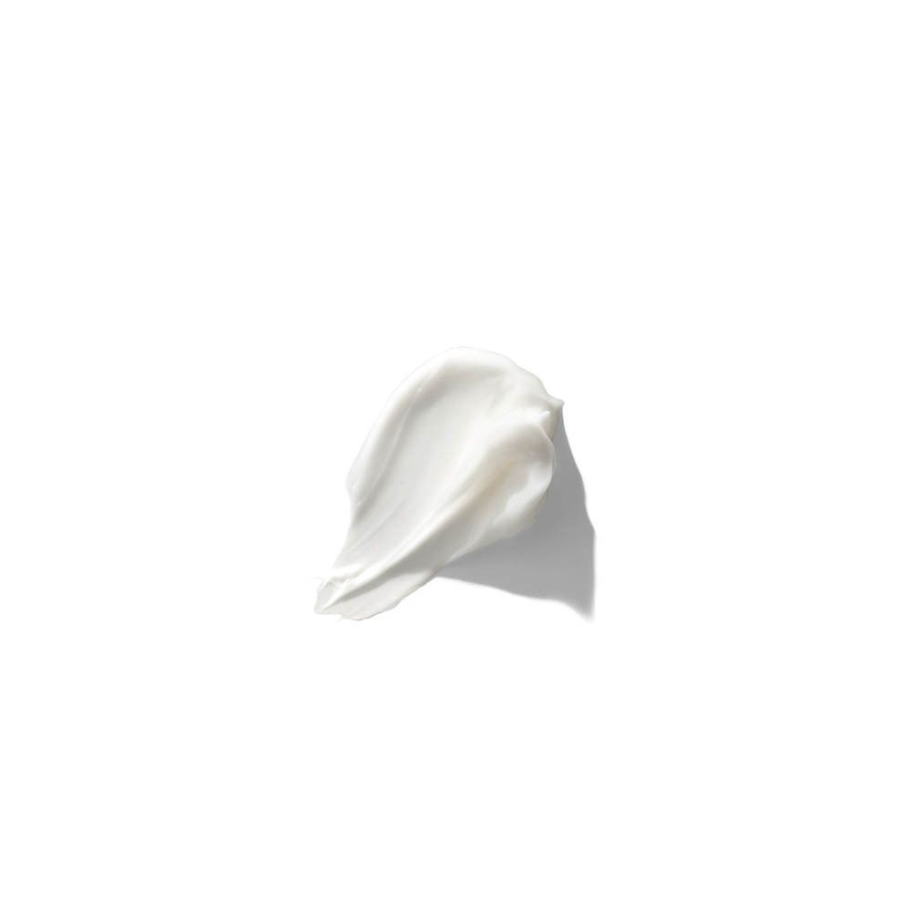 Eine weiße Creme-Spur auf weißem Hintergrund.
