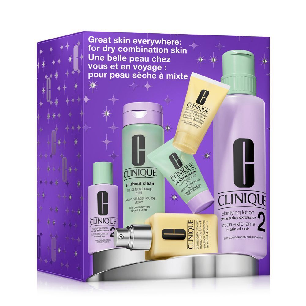 Clinique Hautpflege-Set mit mehreren Flaschen und Tuben in lila und grüner Verpackung.