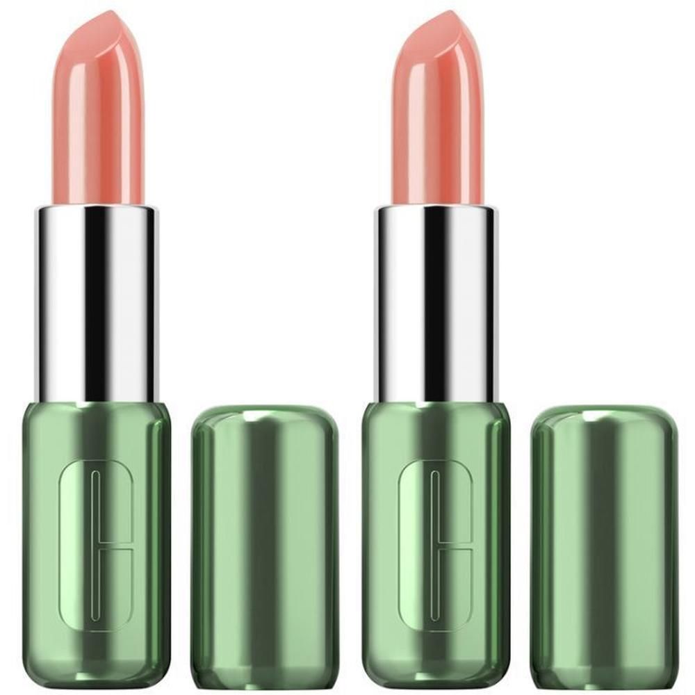 Zwei Clinique Pop Lippenstifte in Nude Pop mit silbernen Applikatoren und grünen Kappen.