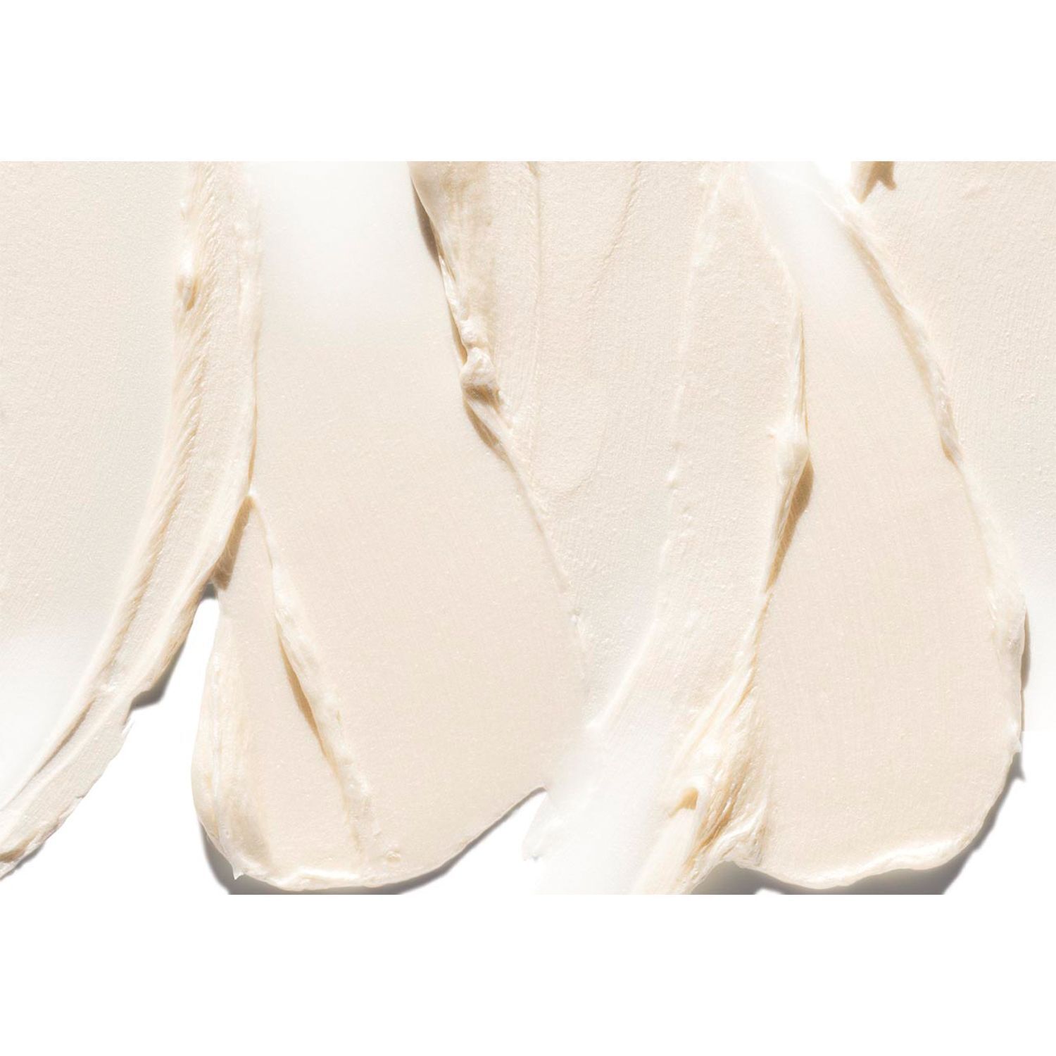 Cremige Textur von Clinique Deep Comfort Body Wash auf weißem Hintergrund.