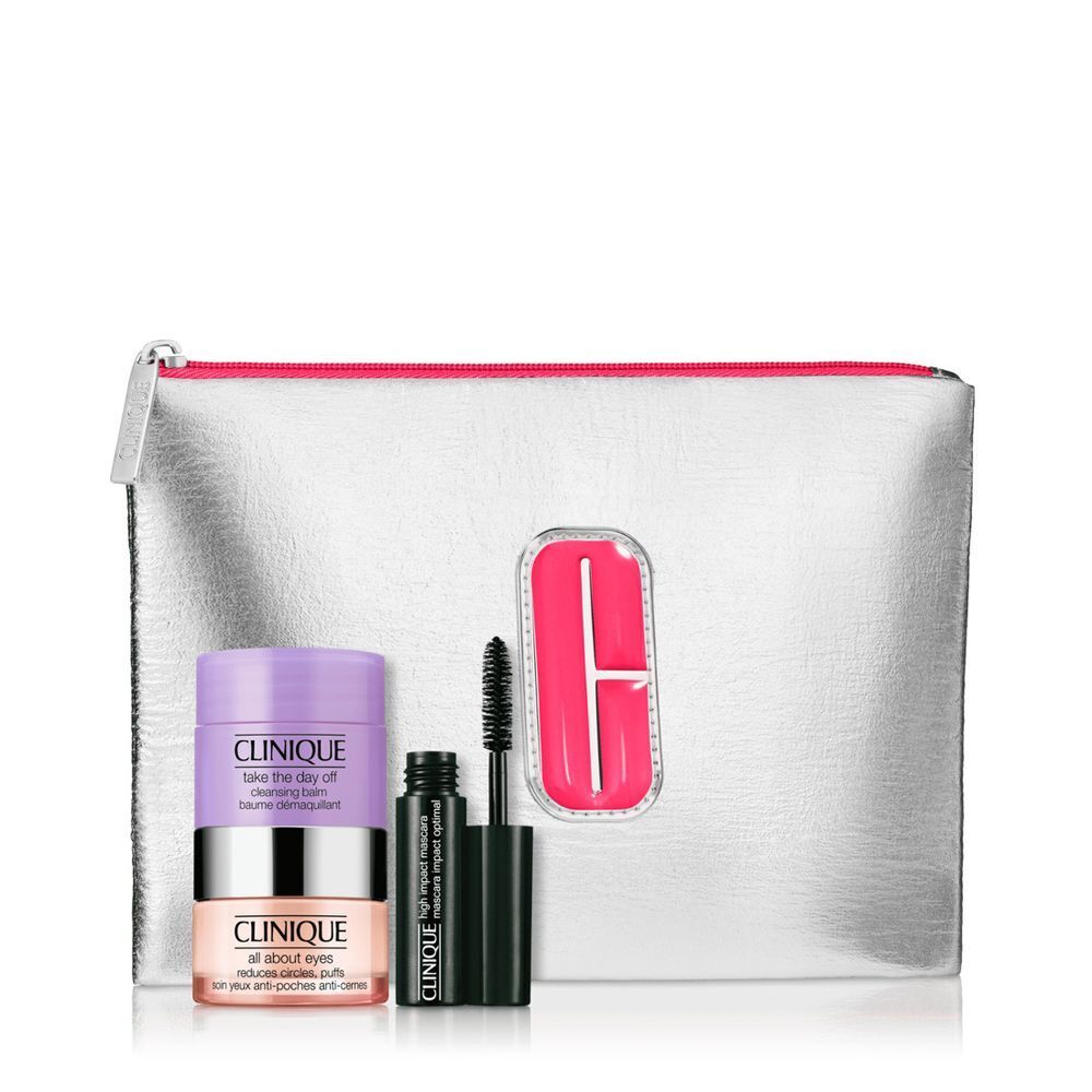 Clinique Glam to Goodnight Set: Silberne Kosmetiktasche mit Augencreme und Mascara.