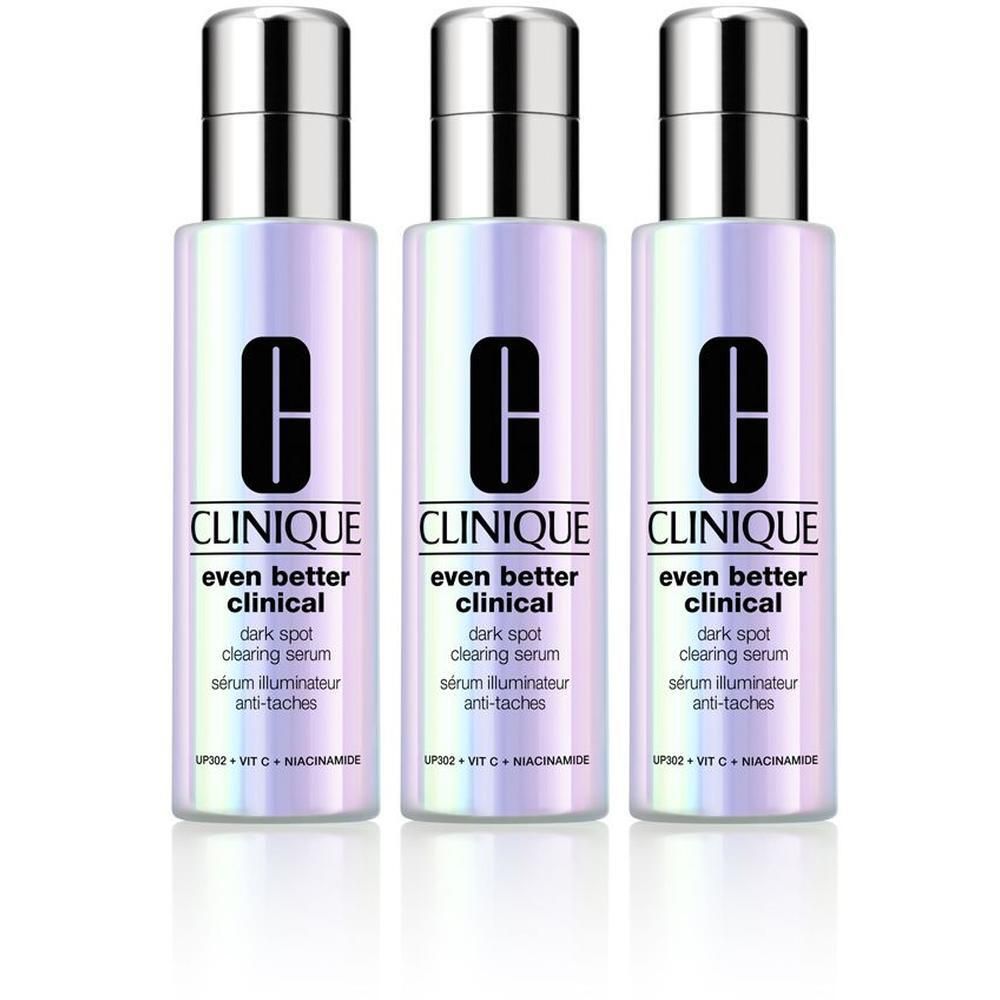 Drei Flaschen Clinique Even Better Clinical Serum mit schillernder Oberfläche und silbernen Verschlüssen.