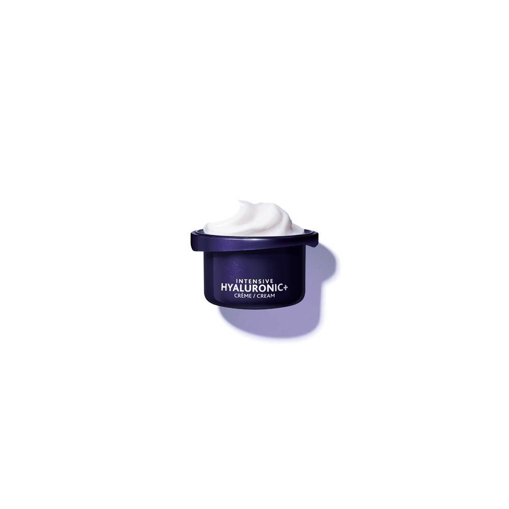 Donkerblauwe pot met witte crème. Opschrift: INTENSIVE HYALURONIC+ CREME / CREAM.