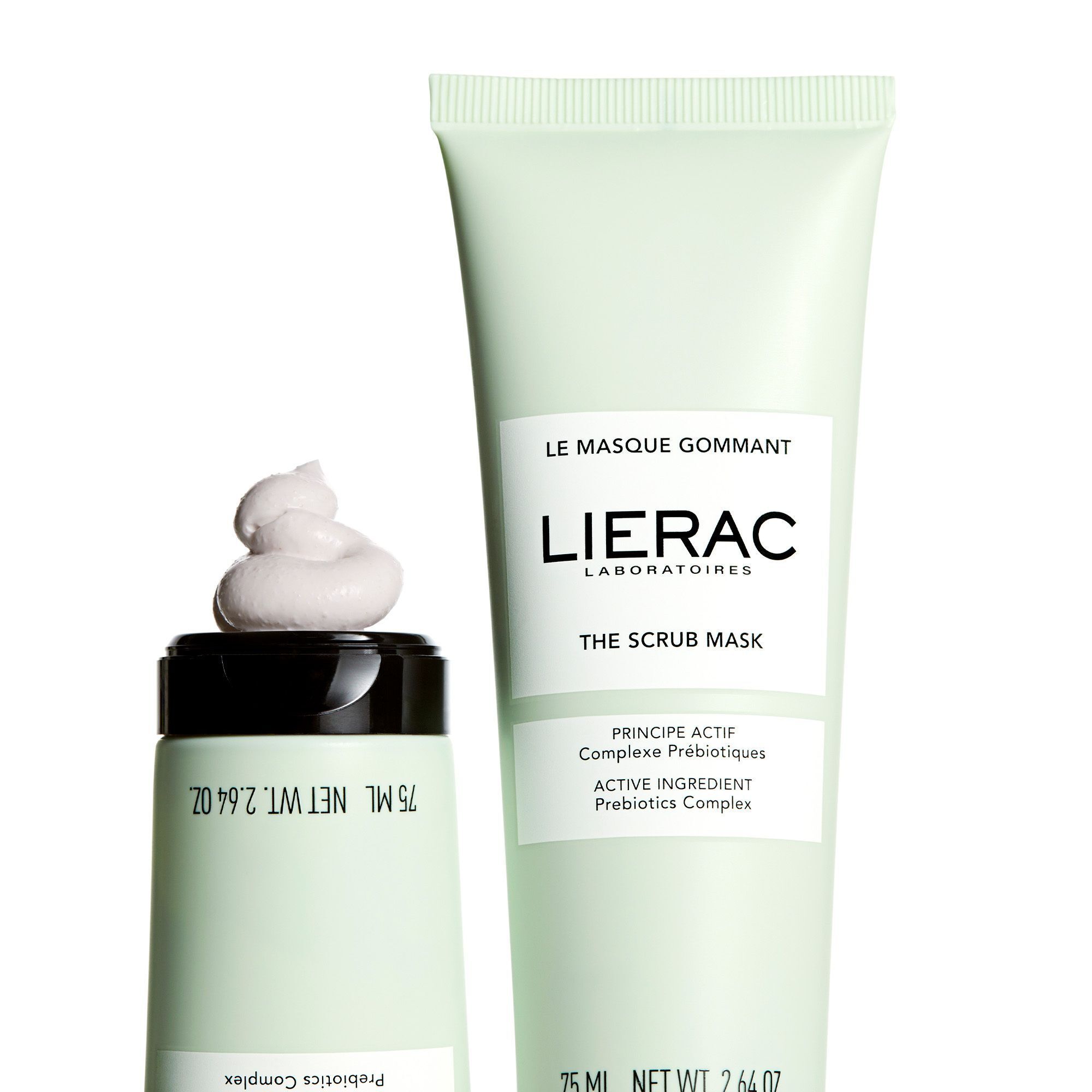 Un tube et une noisette de crème. Inscription "Le Masque Gommant" et "Lierac" sur le tube.