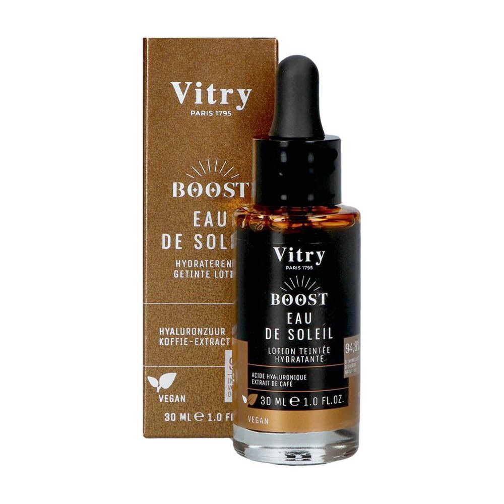 Bruine fles met pipet en goudkleurige doos. Opschrift: Vitry Boost Eau de Soleil, 30 ml, vegan. Met hyaluronzuur.