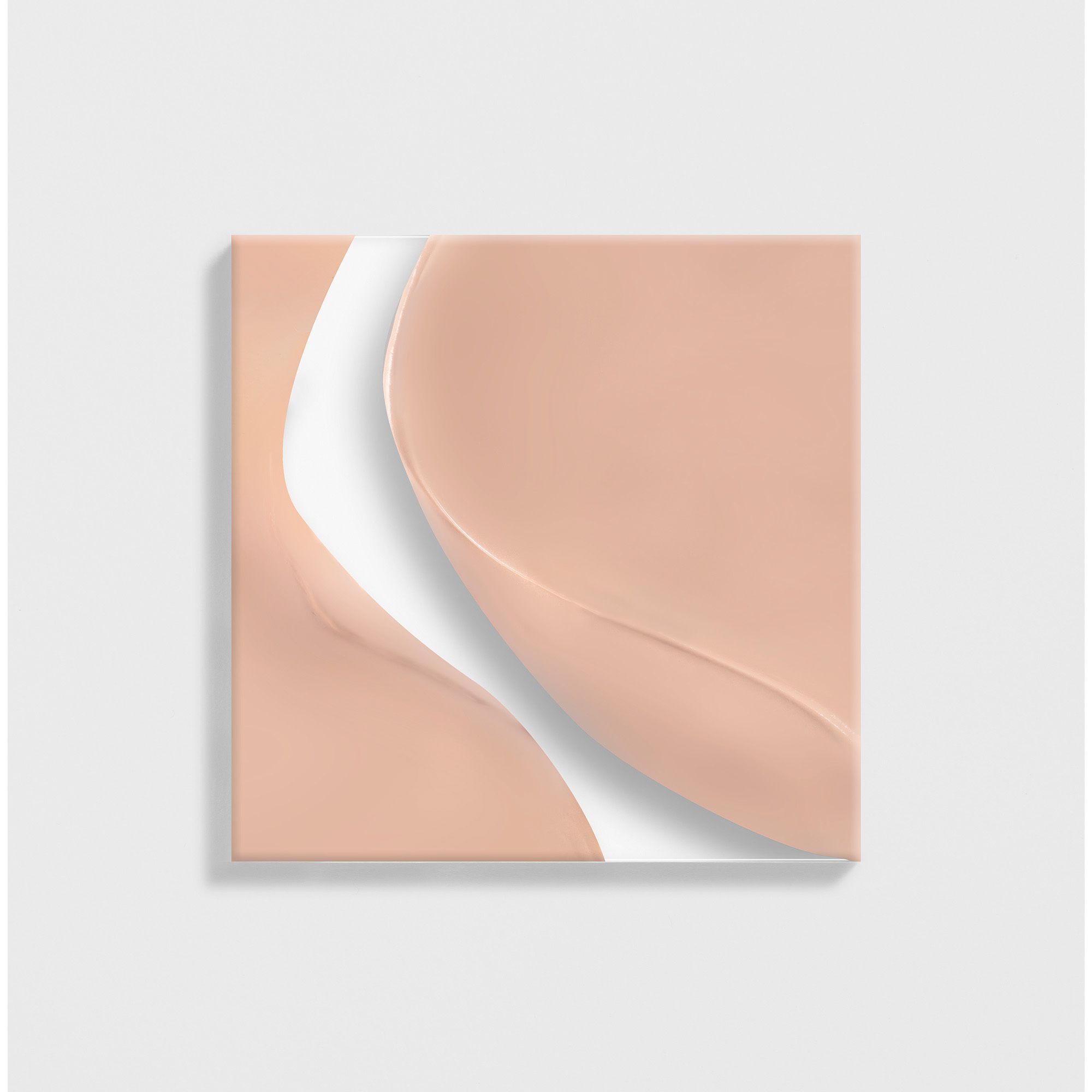 Vierkante weergave van huidkleurig product. Een witte curve verdeelt het oppervlak.