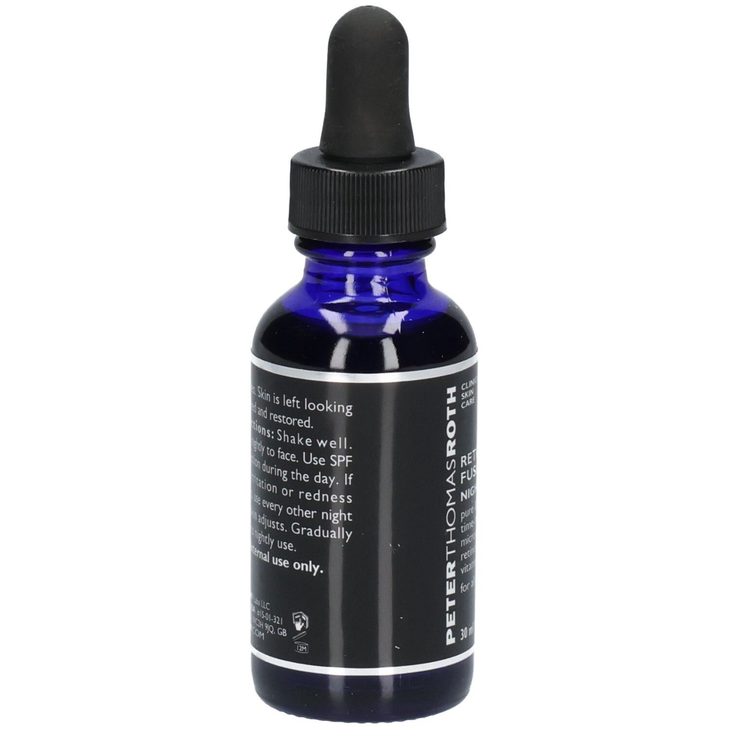 Rückseite der Peter Thomas Roth Retinol Fusion PM Night Serum Flasche mit Anwendungshinweisen und Inhaltsstoffen.