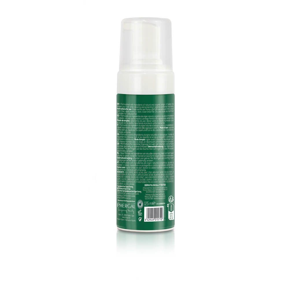 Flacon vert avec pompe et étiquette texte et code-barres. 125 ml.