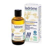 Un flacon d'huile de macération bio de fenugrec Ladrôme à côté de son emballage, tous deux avec des illustrations végétales.