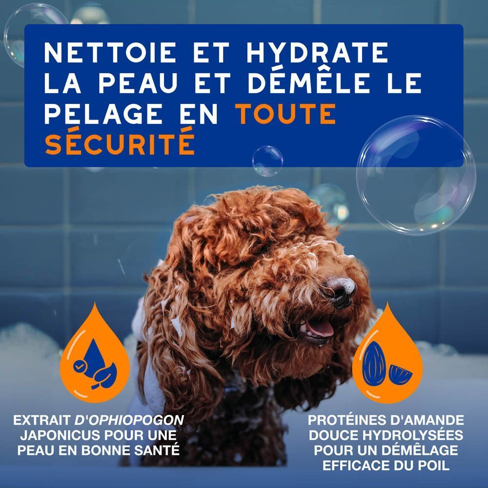Un chien et un bébé dans la mousse, avec du texte sur la peau sensible des chiens.
