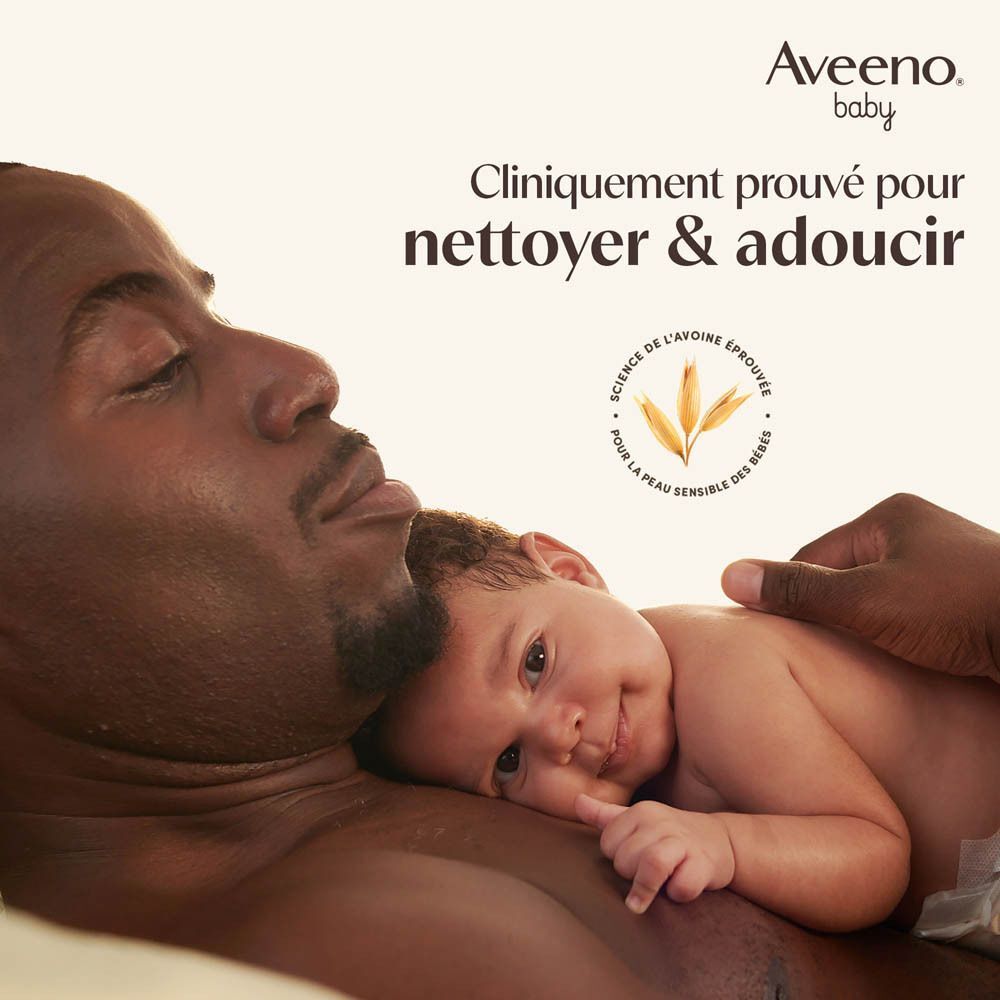 Père et bébé blottis l'un contre l'autre. Aveeno Baby.