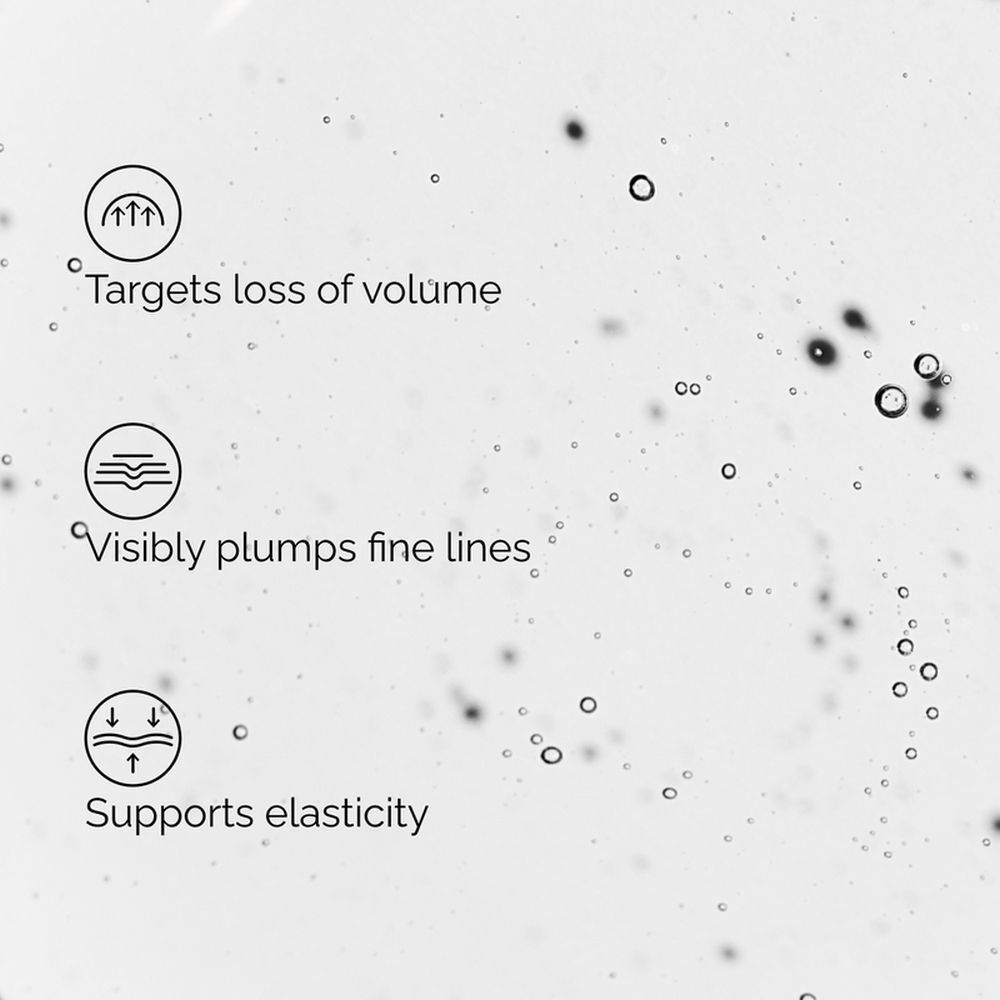Nahaufnahme einer Flüssigkeitstropfen mit Text: 'Volufiline™ zielt auf Bereiche mit Volumenverlust', 'Pal-Isoleucine glättet sichtbar feine Linien und Falten'.