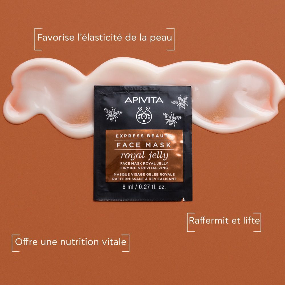 Masque facial Apivita à la gelée royale, entouré d'une texture crémeuse.