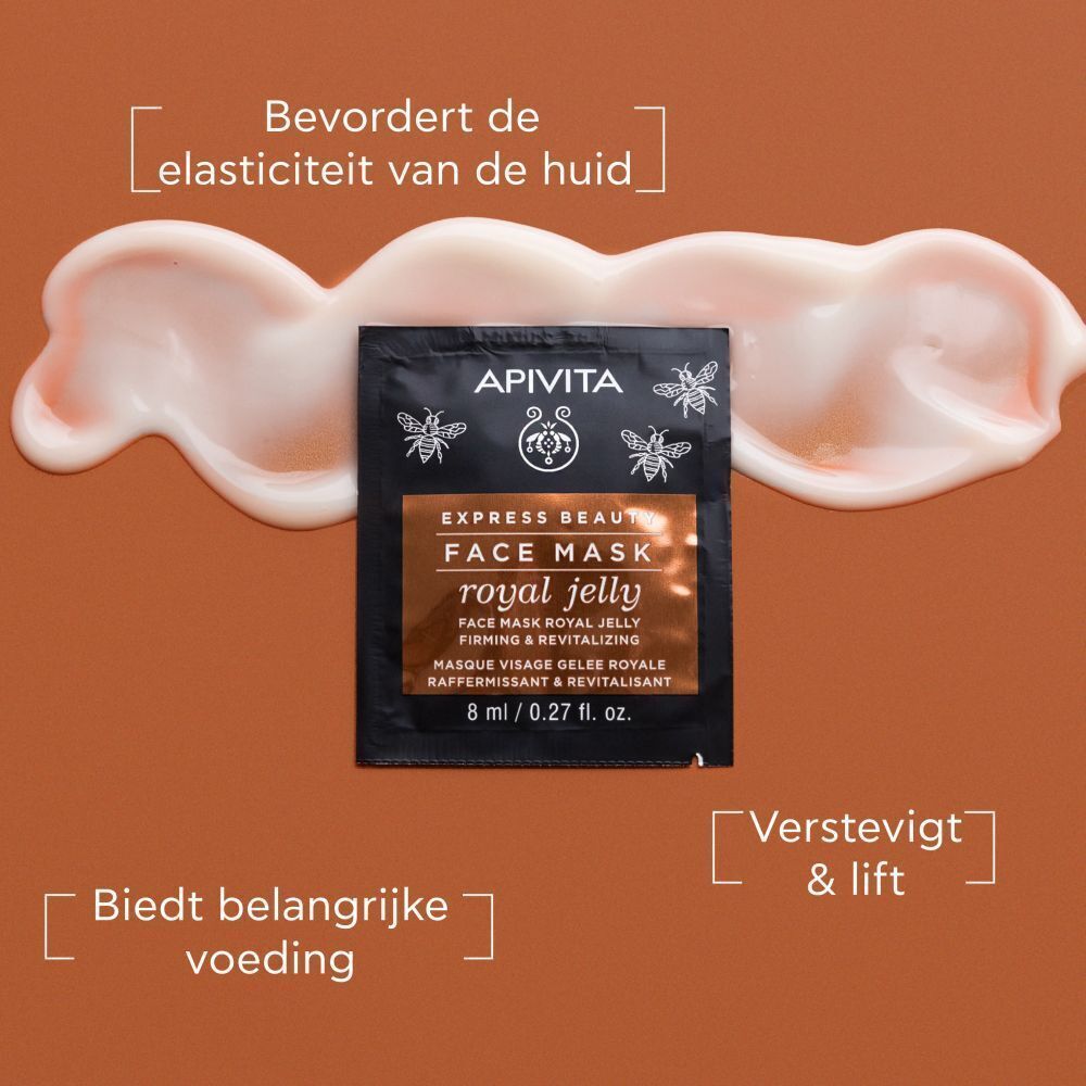 Apivita gezichtsmasker met koninginnenbrij, omgeven door romige textuur.