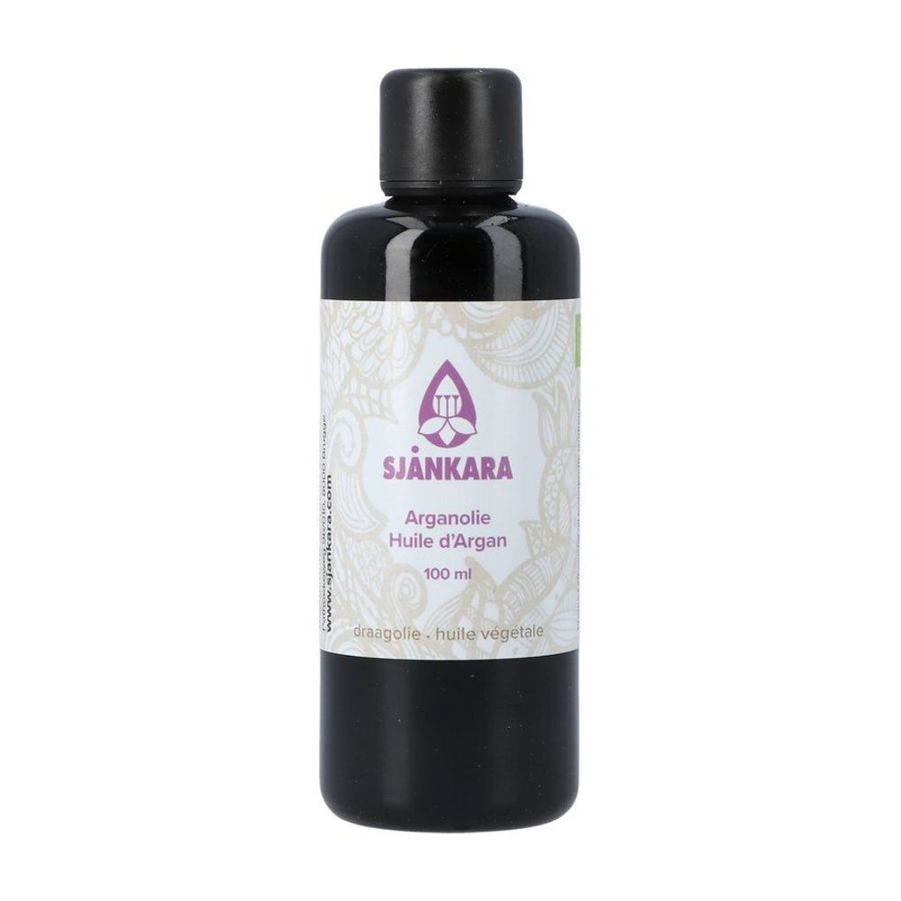 Un flacon d'Huile d'Argan Bio Sjankara, 100 ml, avec étiquette et bouchon noir.