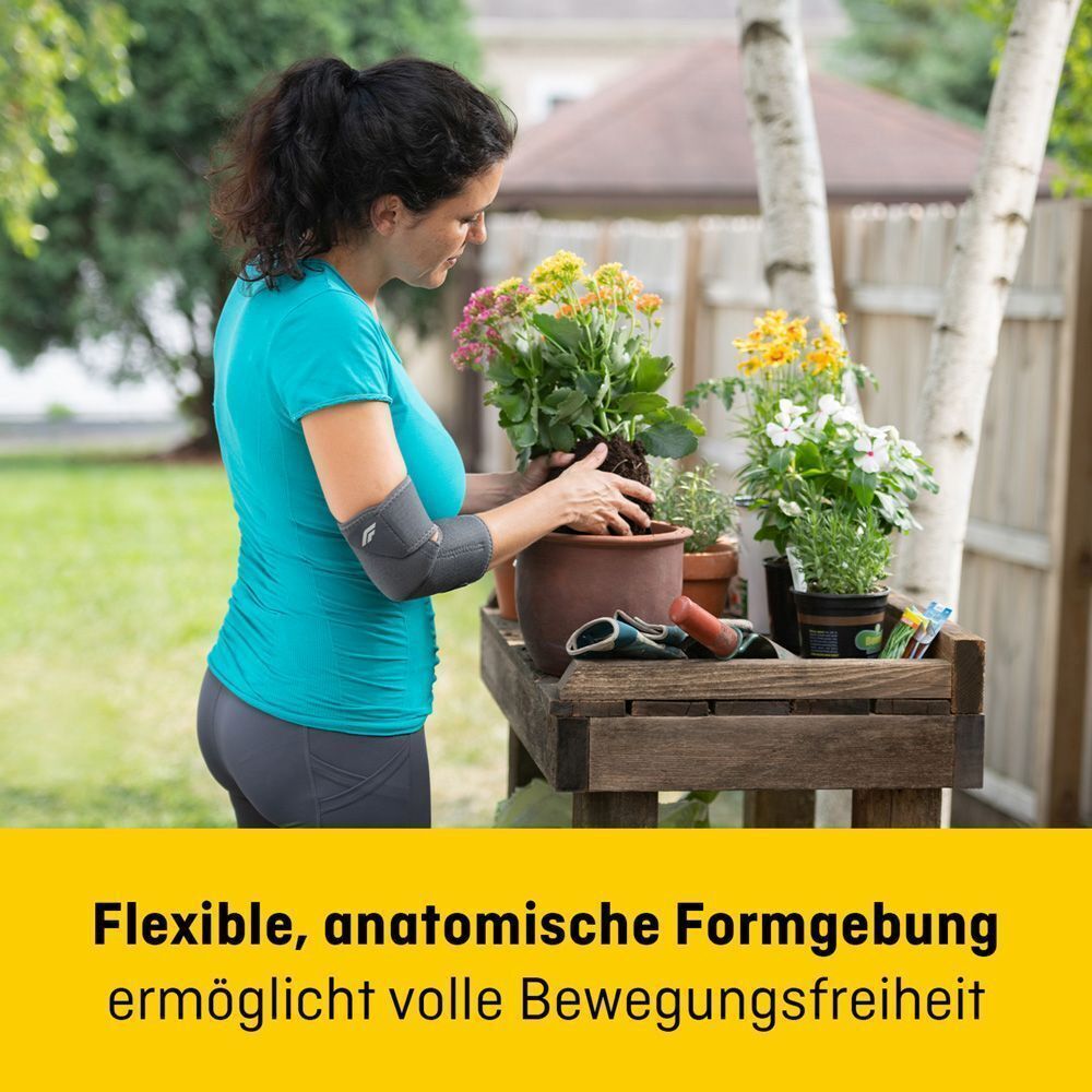 Bandage de coude FUTURO Comfort Fit avec la mention 'Ajustement flexible et anatomique'.