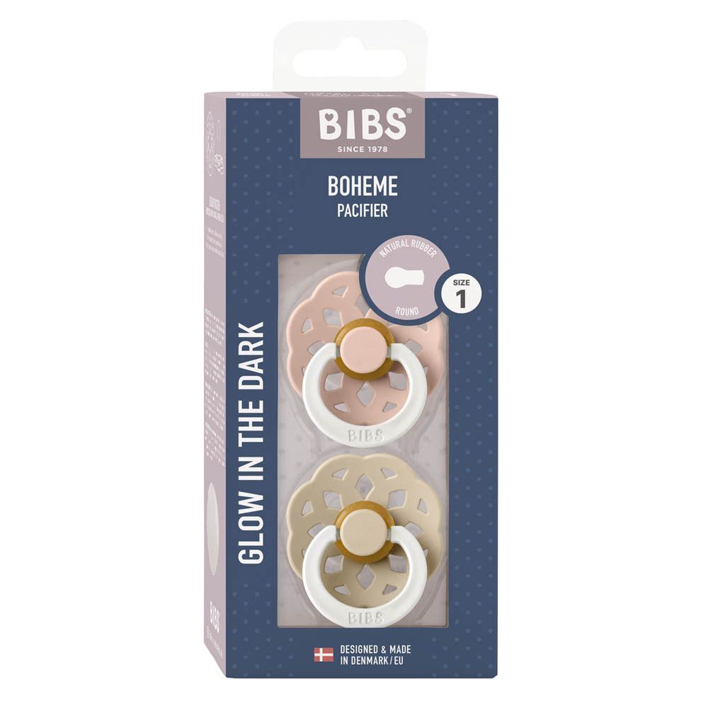 Twee BIBS De Lux fopspenen in roze en beige met bloemen schild.