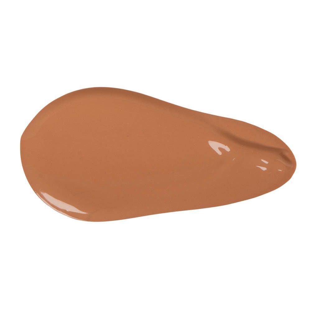 Une seule touche de fond de teint liquide dans une teinte brun clair moyenne.