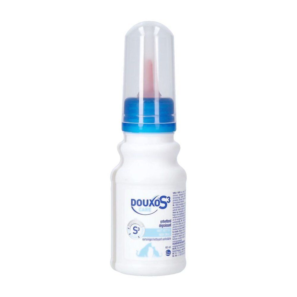 Drie witte flacons met blauwe doppen en doorzichtige beschermkappen die een rode applicator onthullen.