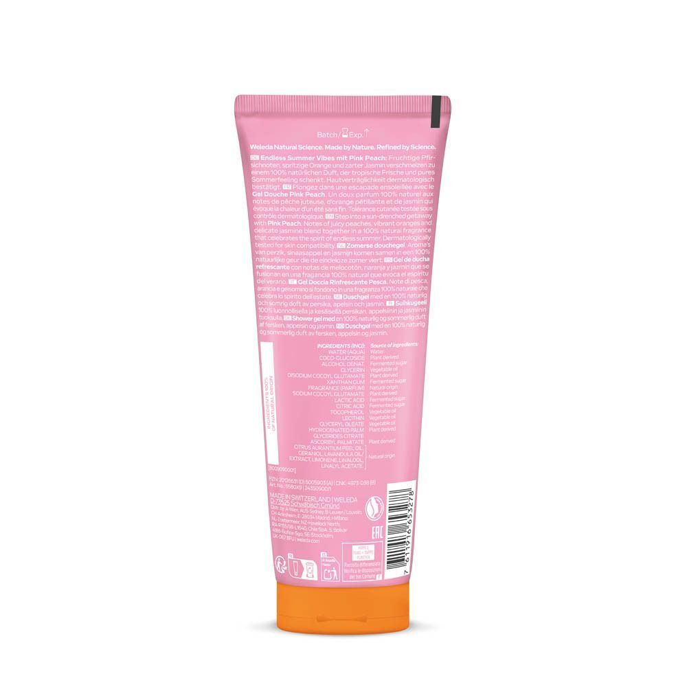Achterkant van een roze Weleda douchegel tube met ingrediëntenlijst en instructies, limited edition.