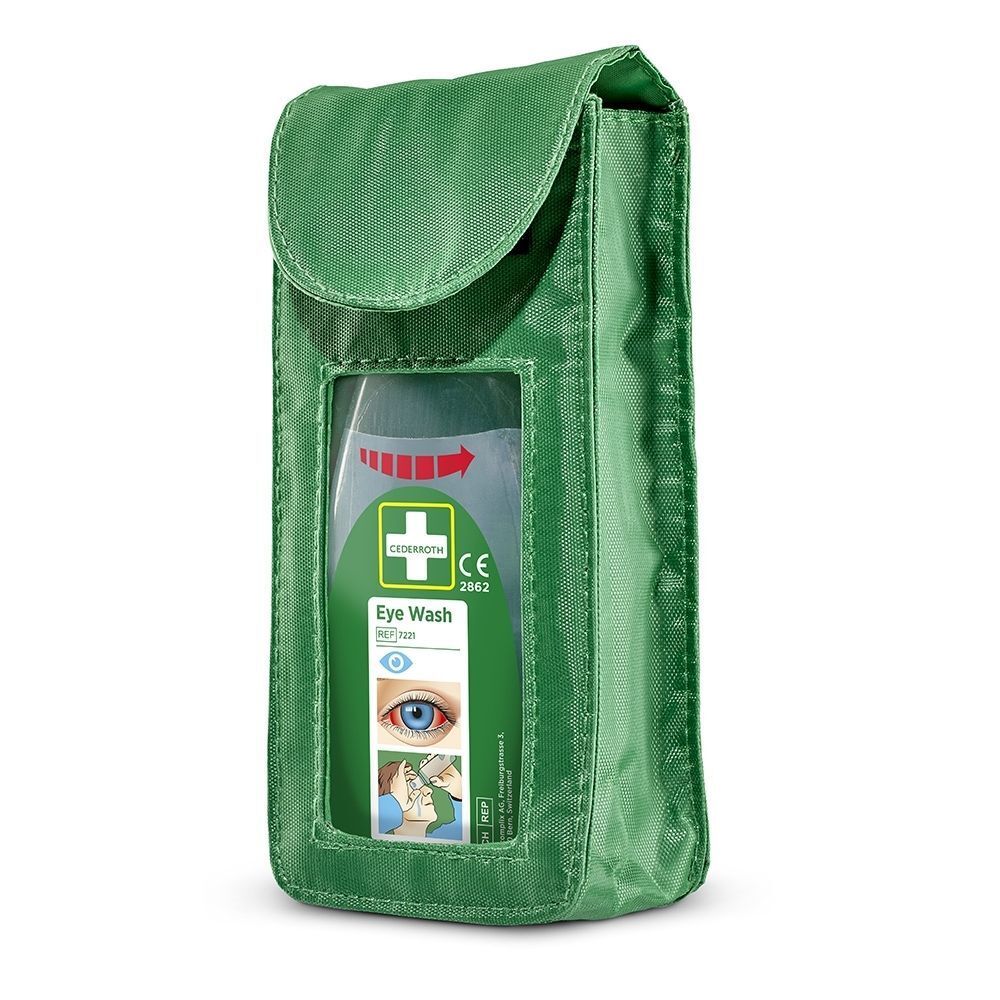 Un étui vert contenant une bouteille de lavage oculaire visible par une fenêtre.