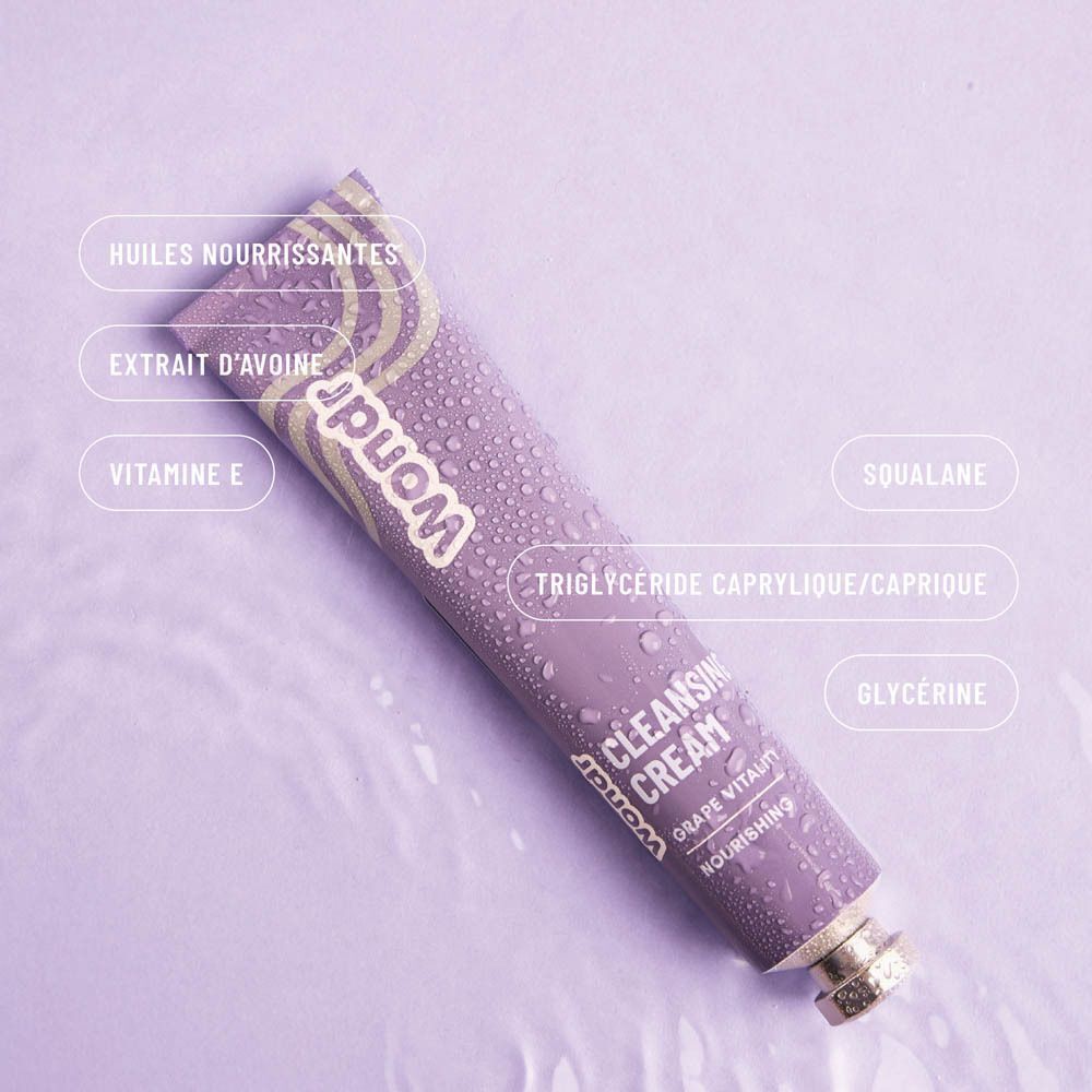 Tube violet WONDR Cleansing Cream Grape Vitality avec gouttes d'eau et étiquettes d'ingrédients.