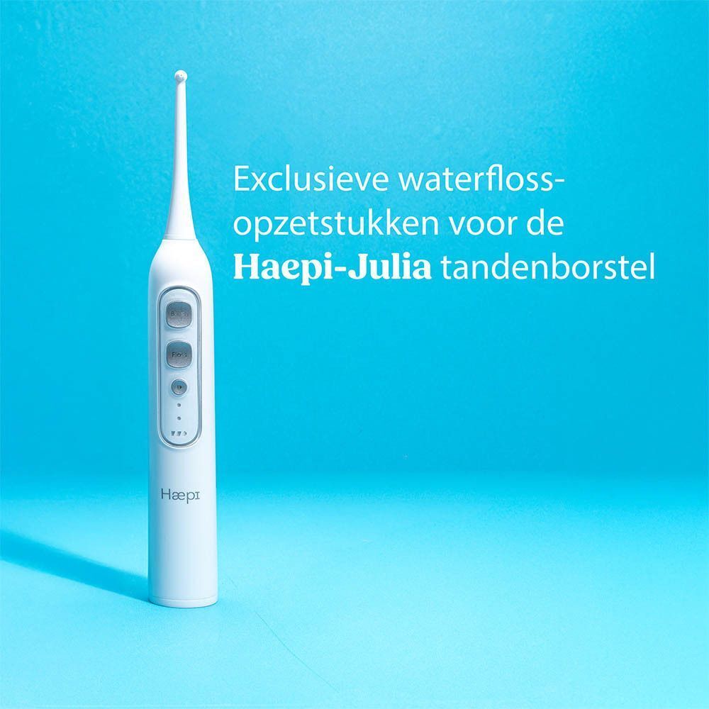 Witte elektrische waterflosser met drie knoppen en een smalle opzetstuk. Merk: Haepi.