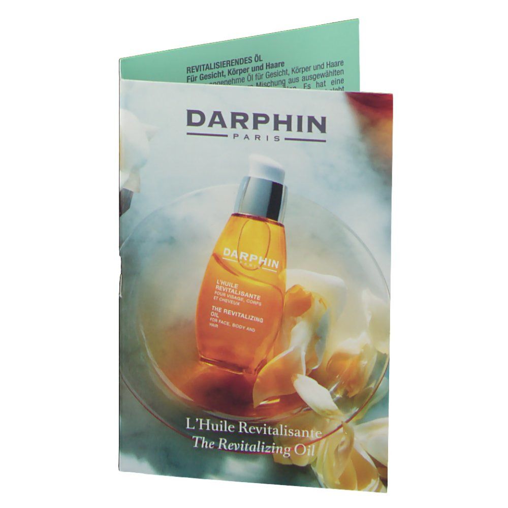 Faltblatt mit Produktabbildung. Darphin-Logo und Produktname. Ölflasche in Schale mit Blüten.