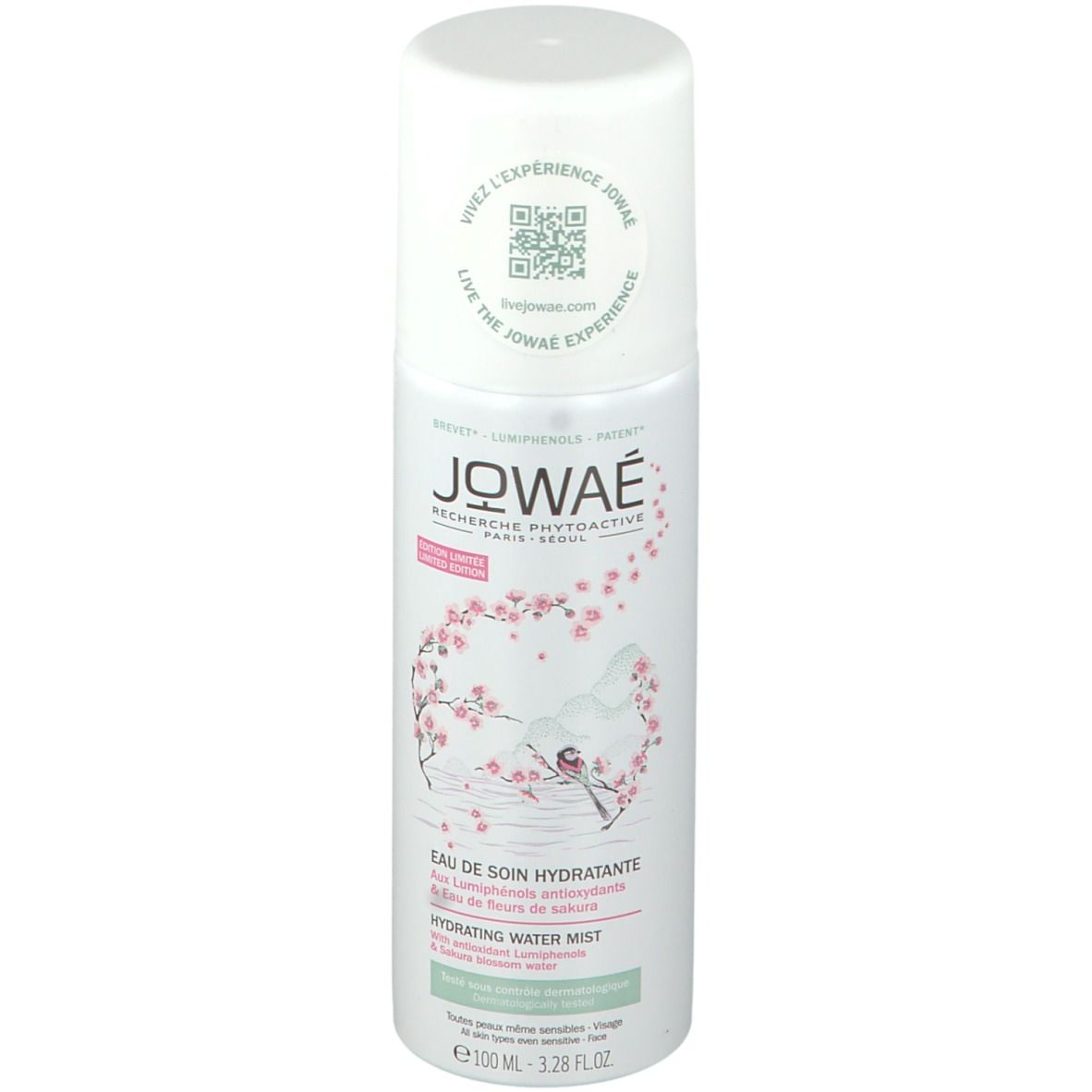 Flacon spray blanc Jowaé. Logo, fleurs de cerisier et texte: Eau de Soin Hydratante, Hydrating Water Mist. Capuchon blanc.