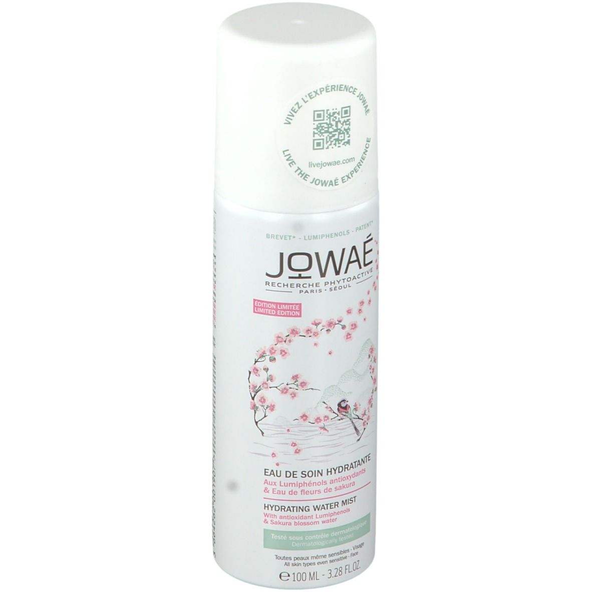 Flacon spray blanc Jowaé. Logo, fleurs de cerisier et texte: Eau de Soin Hydratante, Hydrating Water Mist. Capuchon blanc.