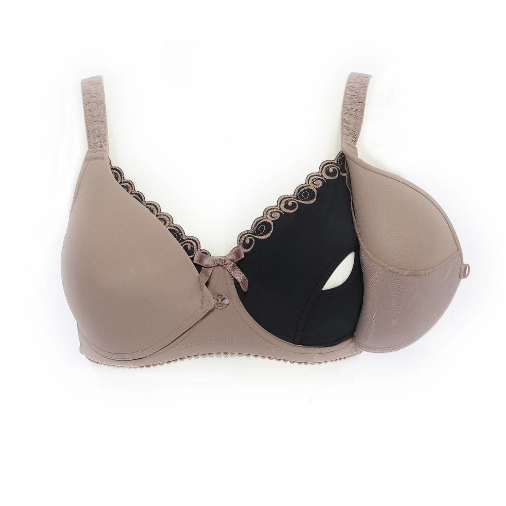Soutien-gorge d'allaitement beige avec insert noir et dentelle. Nœud entre les bonnets. Bretelles réglables.