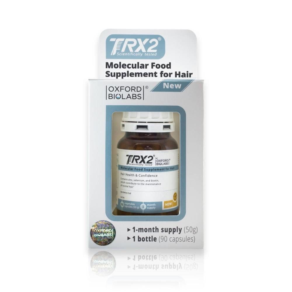 TRX2 voedingssupplement voor haar in een doos. Bevat een fles met 90 capsules. Opschrift: Molecular Food Supplement for Hair.
