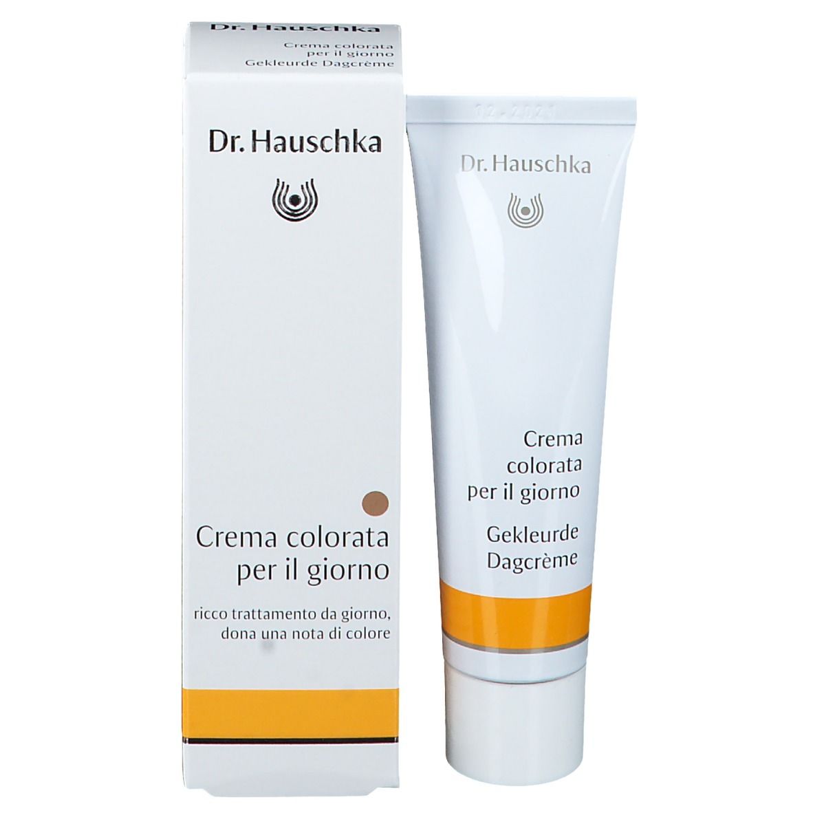 Produkt und Verpackung. Weiße Tube und Schachtel. Text: Crème colorata per il giorno, Gekleurde Dagcrème. Marke: Dr. Hauschka.