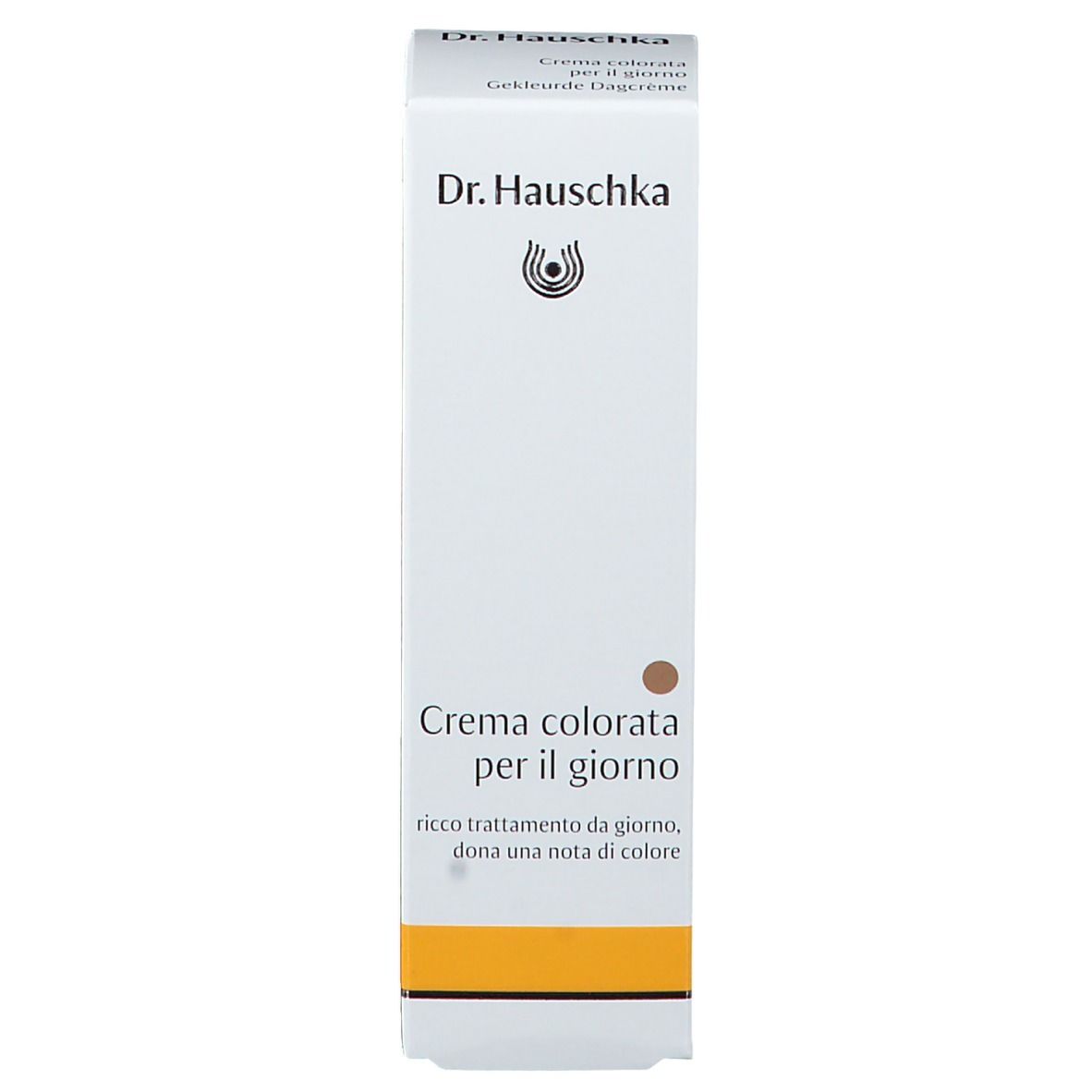 Weiße Schachtel mit gelbem Streifen. Text: Crème colorata per il giorno, Gekleurde Dagcrème. Marke: Dr. Hauschka.