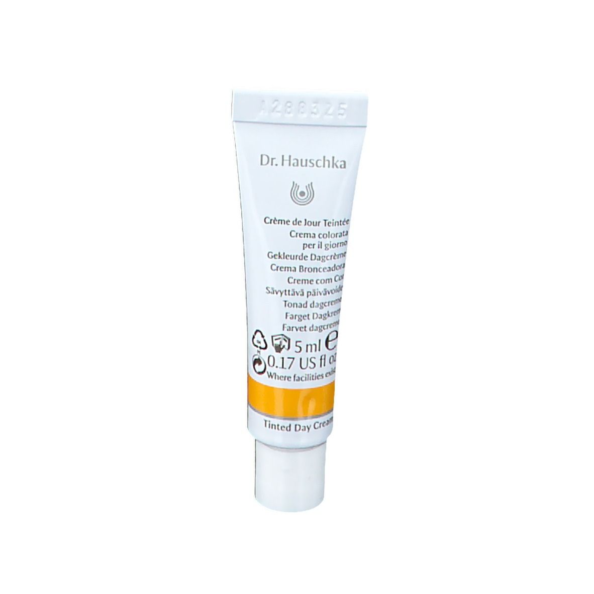 Witte tube met gele streep. Opschrift: Dr. Hauschka, Crème de jour Teintée, 5 ml.