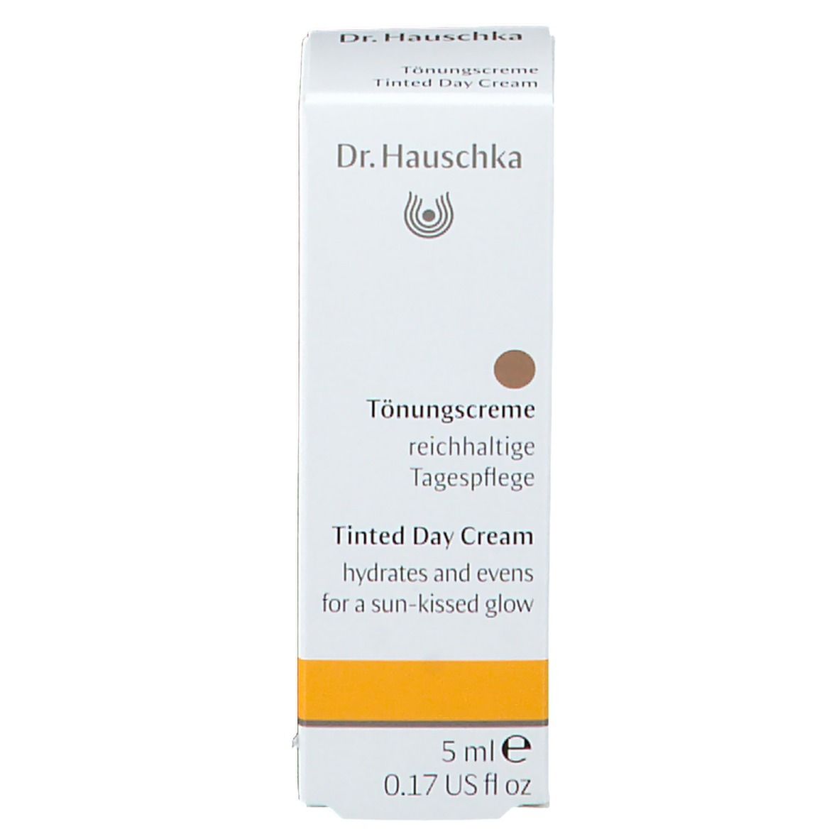 Doos met opschrift: Dr. Hauschka, Tönungscreme, 5 ml. Gele streep onderaan.