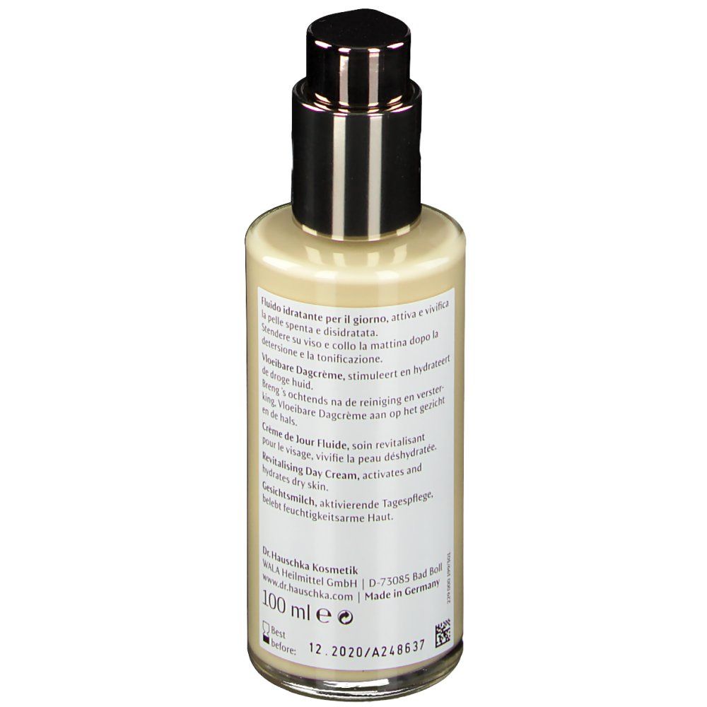 Flacon beige avec pompe argentée. Dos avec texte. Bande orange. 100 ml.