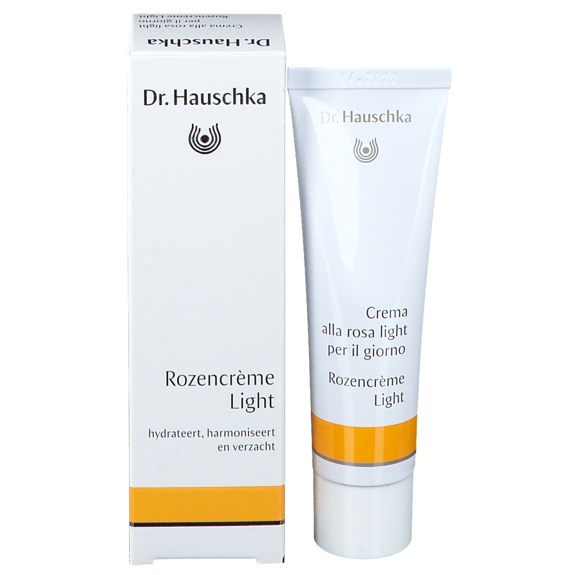 Emballage du produit. Boîte et tube blancs. Inscription: Dr. Hauschka, Rozencreme Light. Bande jaune.