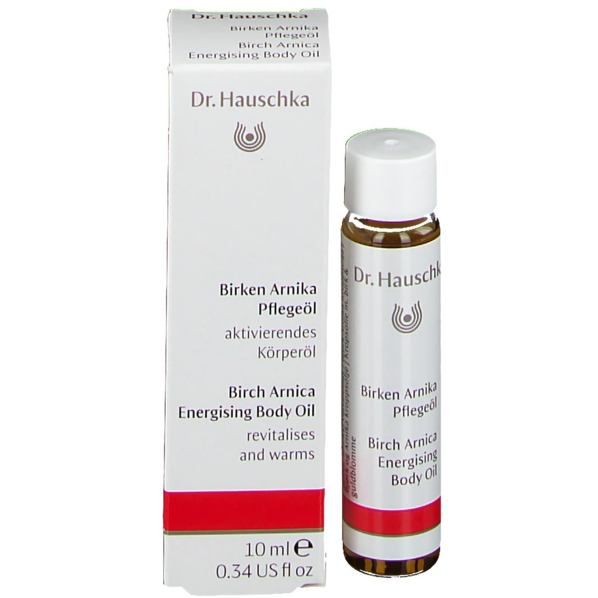 Productfles en verpakking. Verpakking: wit, opschrift: Dr. Hauschka, Birken Arnika Pflegeöl, 10 ml, 0.34 US fl oz.