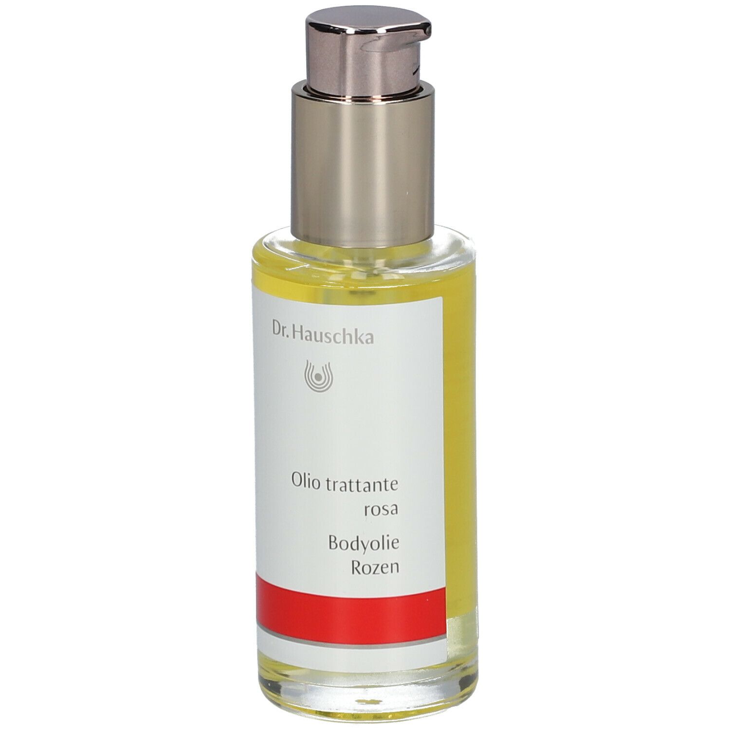 Body-olie fles met zilveren pomp. Etiket met tekst: Dr. Hauschka, Oilo trattante rosa, Bodyolie Rozen.