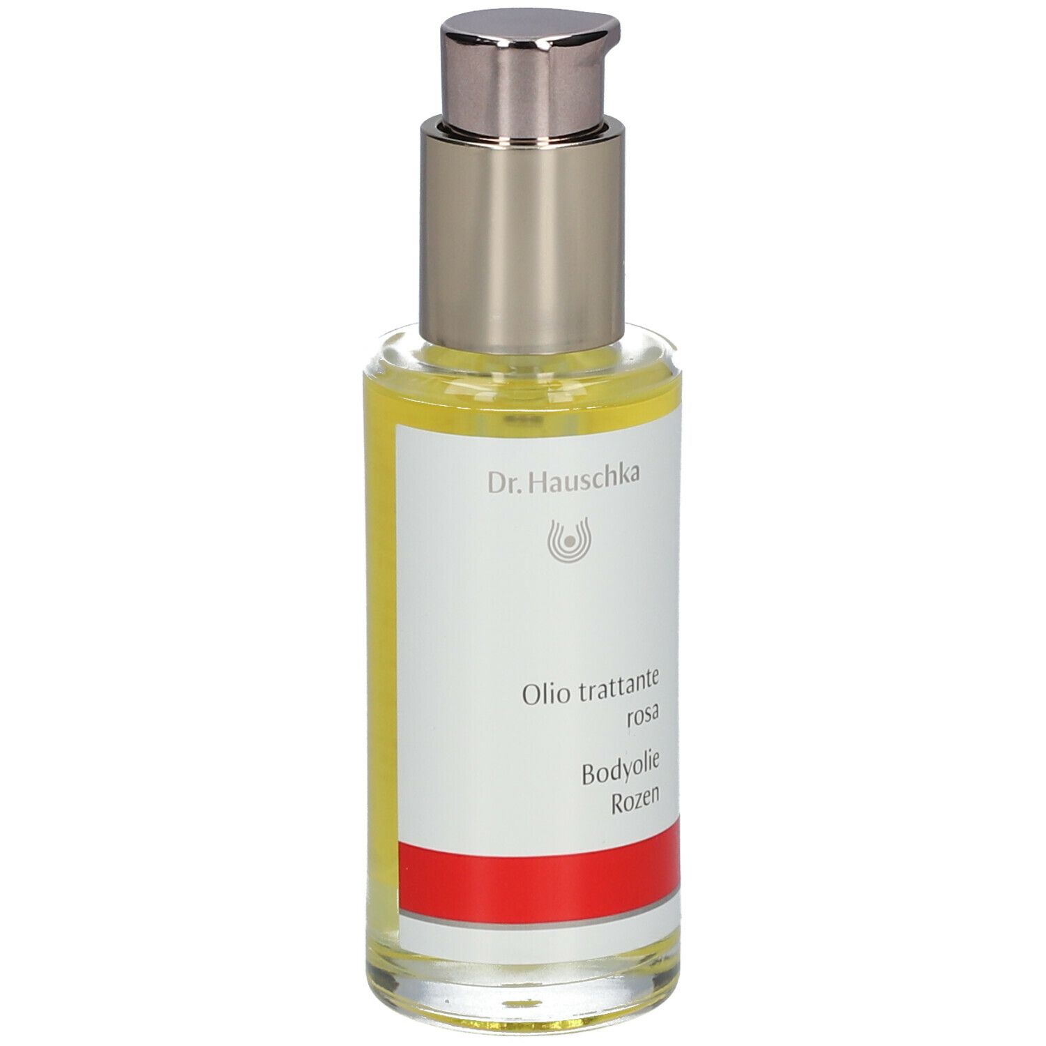 Body-olie fles met zilveren pomp. Etiket met tekst: Dr. Hauschka, Oilo trattante rosa, Bodyolie Rozen.