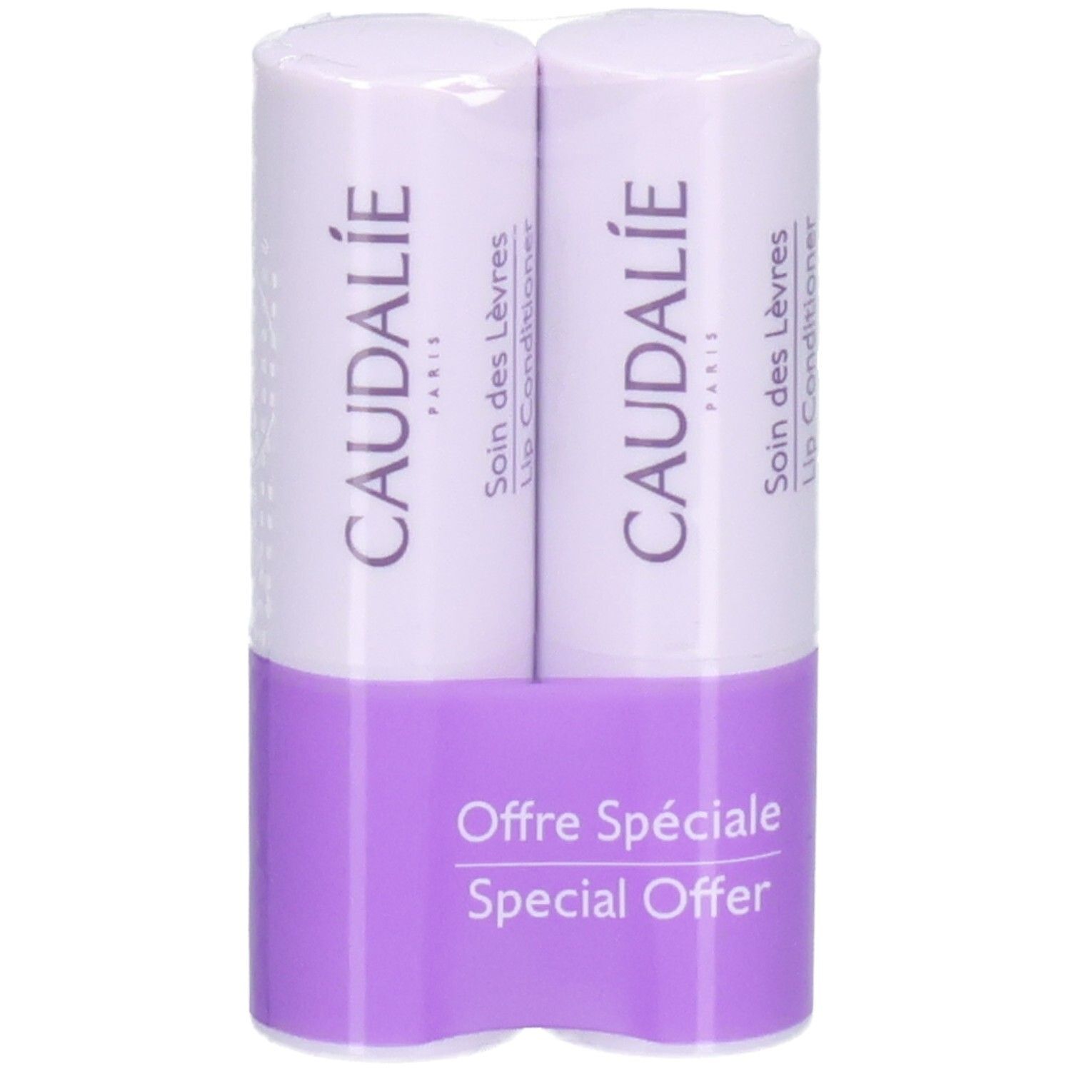 Zwei Lippenpflegestifte in Verpackung. Marke CAUDALIE. Lila Halterung mit Text: Offre Spéciale, Special Offer.