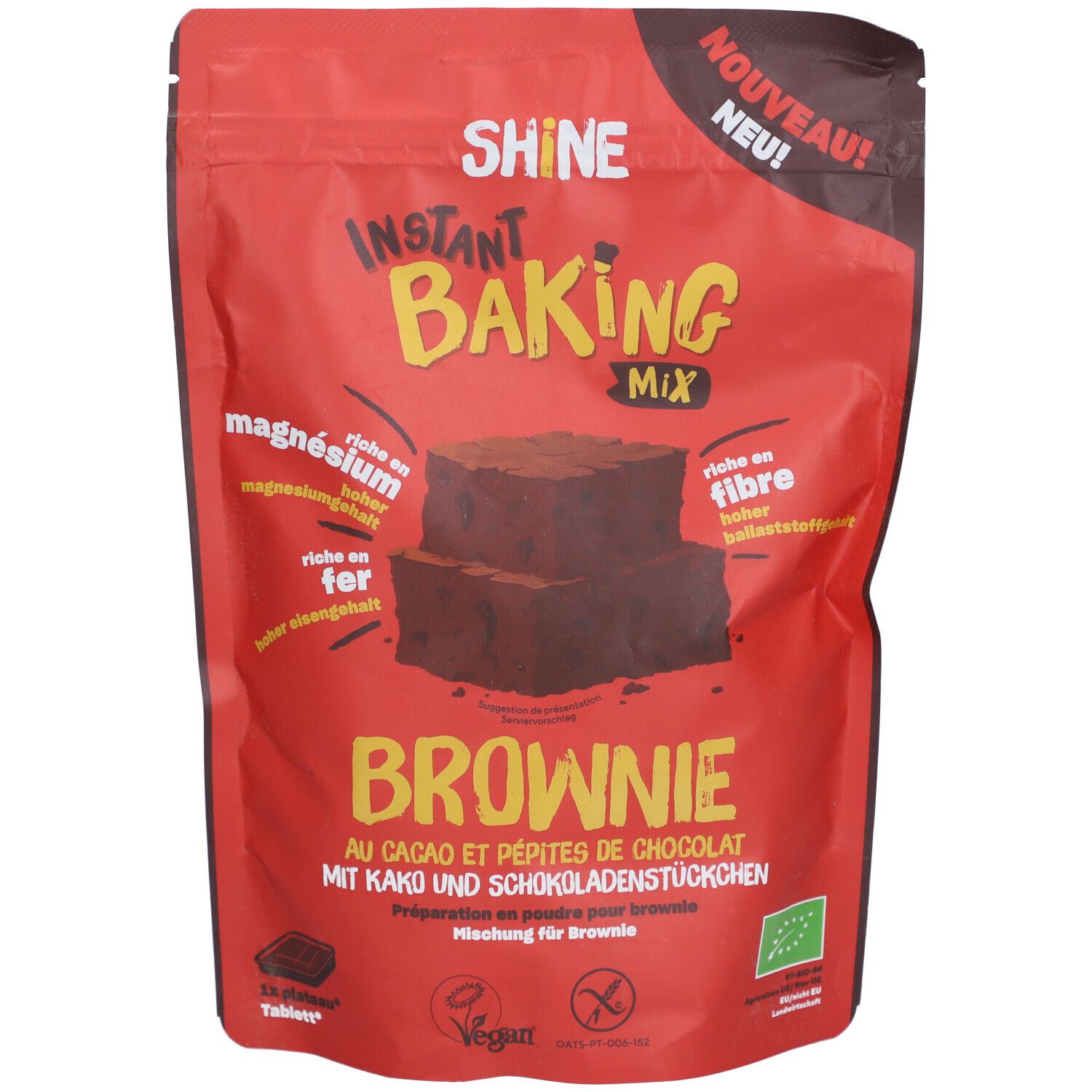 Rote Tüte mit "SHINE Instant Baking Mix Brownie". Text: "Mit Kakao und Schokoladenstückchen". Bio-Siegel.