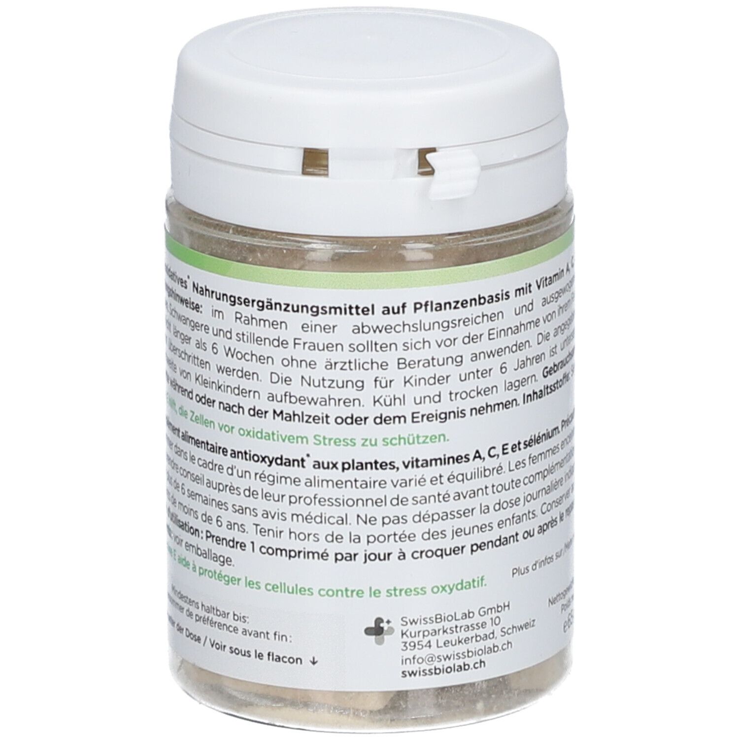 Boîte avec couvercle blanc. Inscription : Alpx, F, STAY FIT. Swiss Made. Texte en allemand et français. Vegan.
