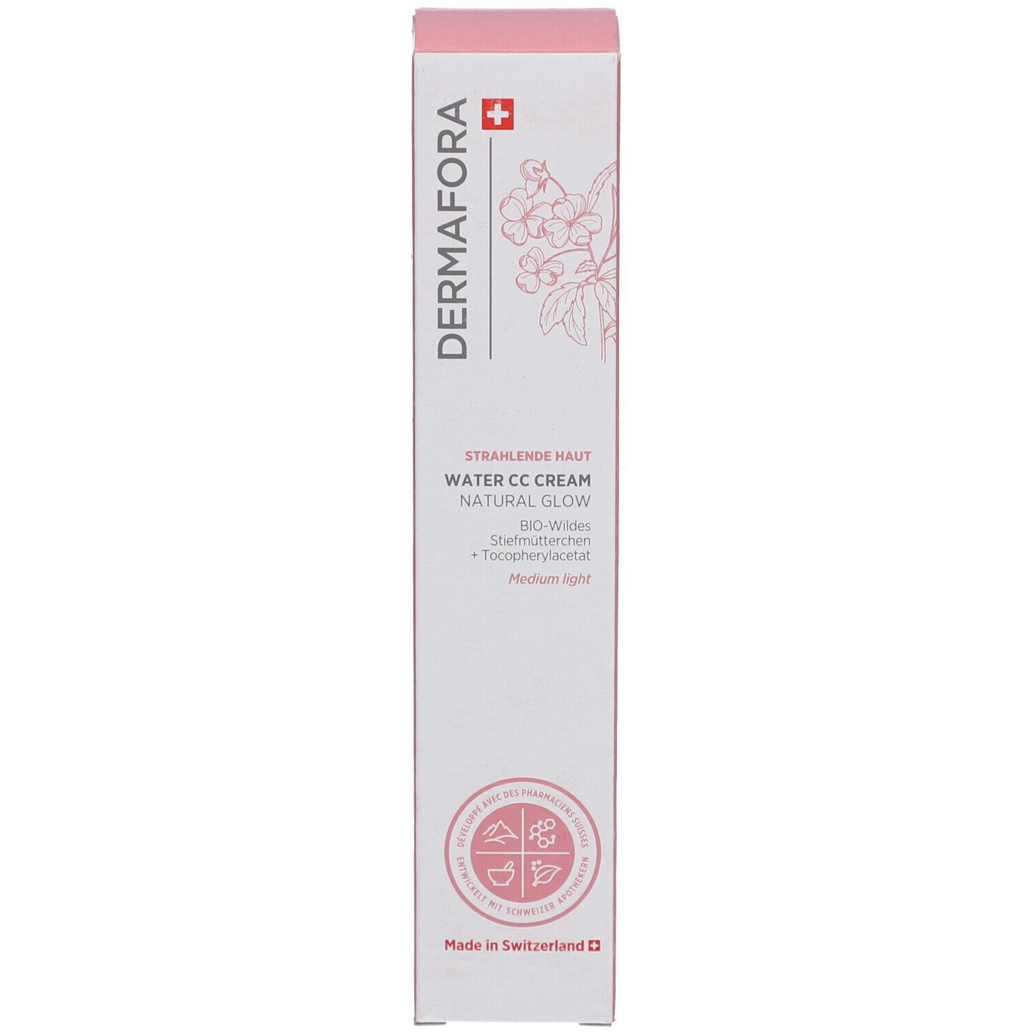 Schachtel mit rosa Akzenten. Aufschrift: Dermafora, Water CC Cream Natural Glow. Schweizer Kreuz und florales Muster.