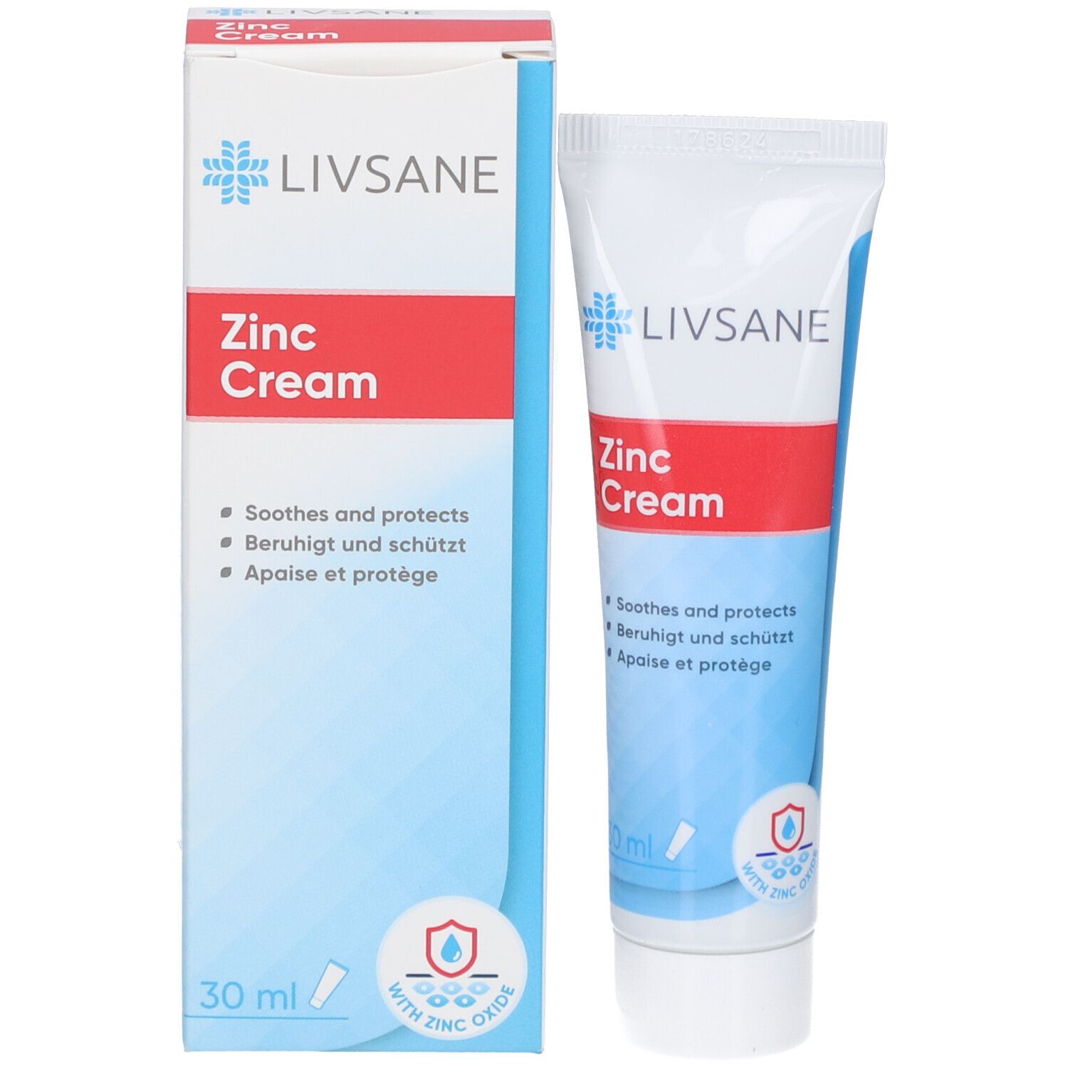 Schachtel und Tube LIVSANE Zink Cream. Weiß, blau und rot. Enthält Zinkoxid. Text: Soothes and protects, Beruhigt und schützt, Apaise et protège.
