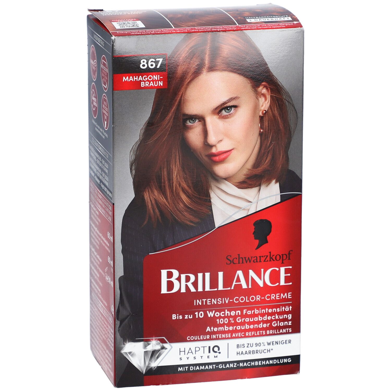 Haarfarben-Packung. Schwarzkopf Brillance, Farbton 867 Mahagonibraun. Frau mit rotbraunem Haar auf der Verpackung.