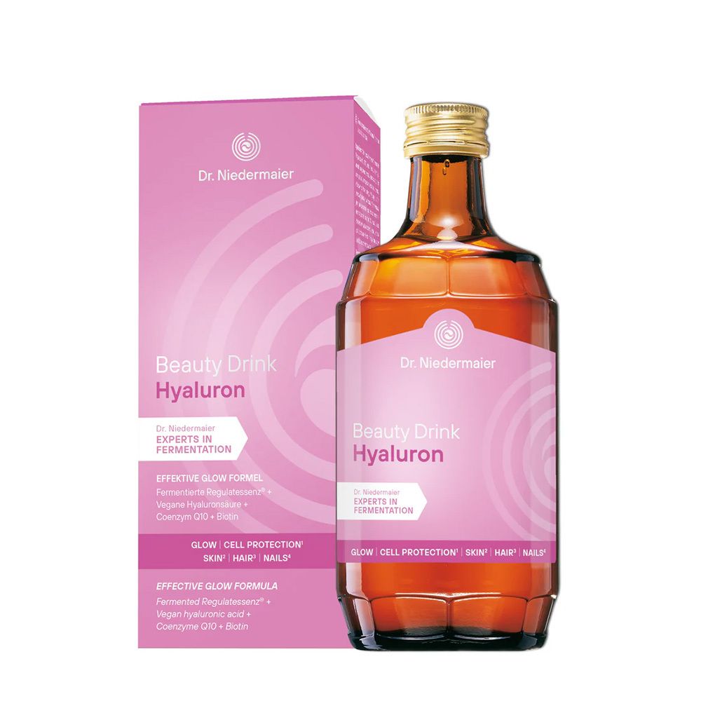 Flasche und Verpackung von Beauty Drink Hyaluron. Rosa Etikett mit Produktnamen und Logo. Braune Glasflasche mit goldfarbenem Verschluss.