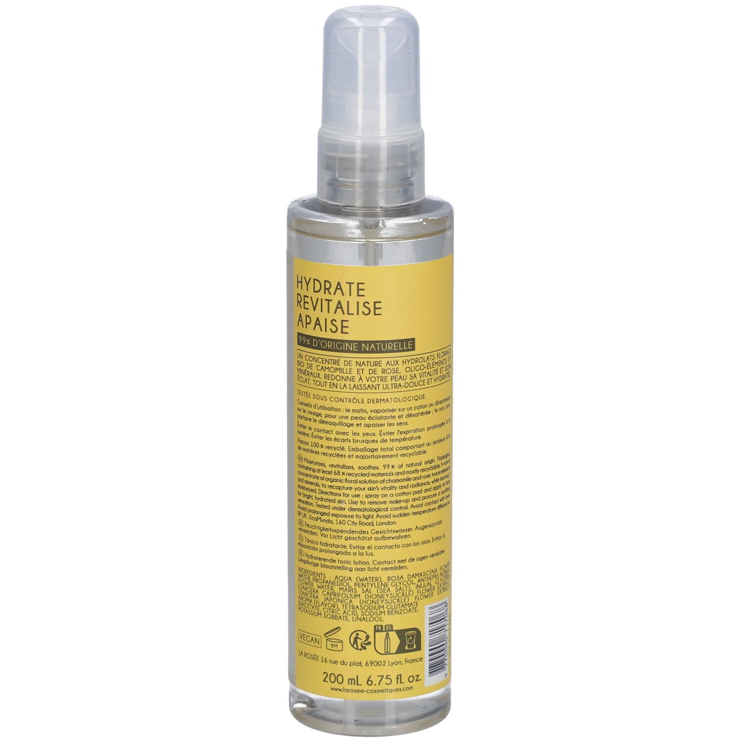 Flacon de lotion tonique avec vaporisateur. Dos avec étiquette jaune et texte. LA ROSÉE PARIS. 200 ml.